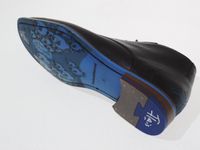 Schuh von Van Bommel, 10